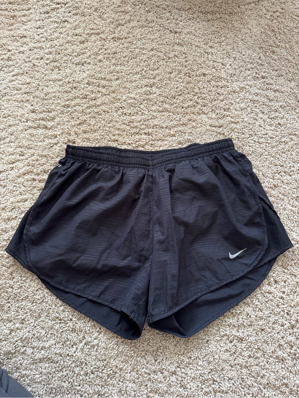 Nike Women’s Black Athletic Shorts with Silver Swoosh